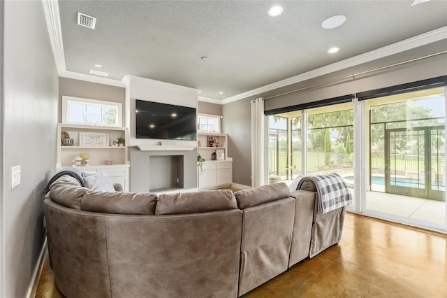 living room featuring wood-type flooring, ornamental molding, and a textured ceiling