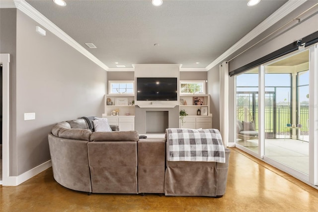 living room with ornamental molding, plenty of natural light, and a textured ceiling