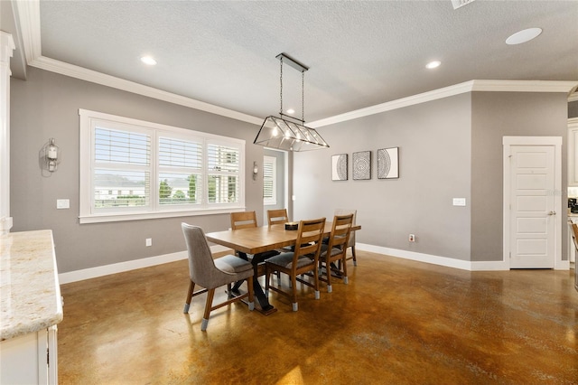 dining room featuring ornamental molding and a textured ceiling