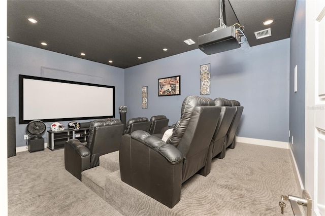 home theater with light carpet and a textured ceiling