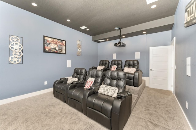 home theater featuring light colored carpet and a textured ceiling