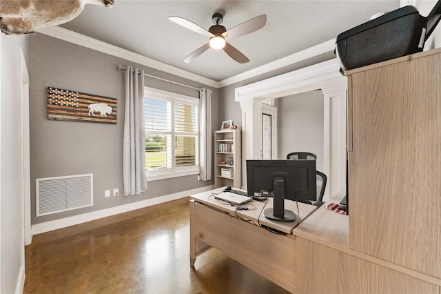 office area featuring ornate columns, ceiling fan, crown molding, and a textured ceiling