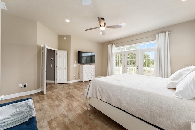 bedroom featuring ceiling fan, light hardwood / wood-style flooring, and access to exterior