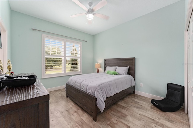 bedroom featuring ceiling fan and light wood-type flooring