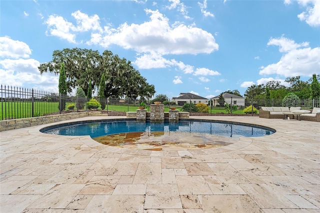 view of swimming pool with a patio area