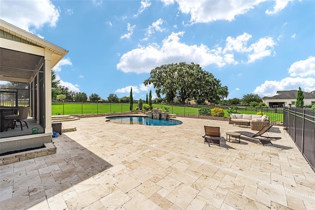 view of swimming pool featuring an outdoor living space, a yard, a sunroom, and a patio area