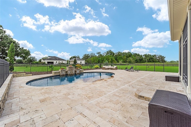 view of swimming pool with a patio, a lawn, and pool water feature