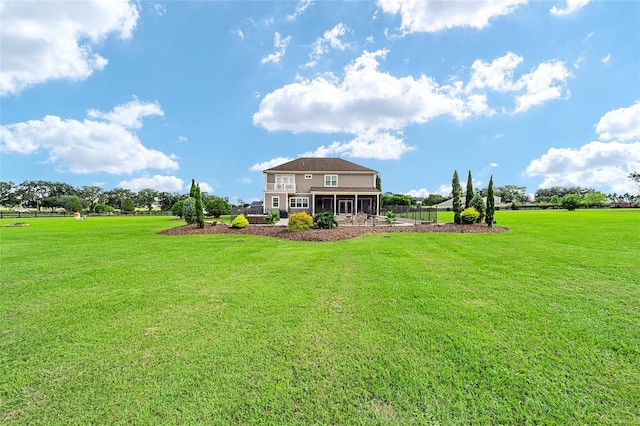 view of yard with a sunroom