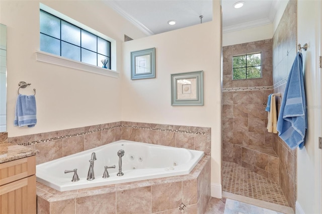 bathroom with vanity, crown molding, and plus walk in shower