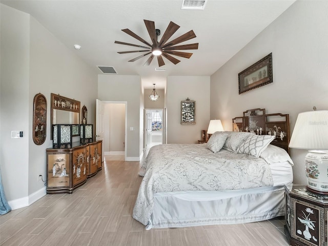 bedroom featuring light hardwood / wood-style flooring and ceiling fan