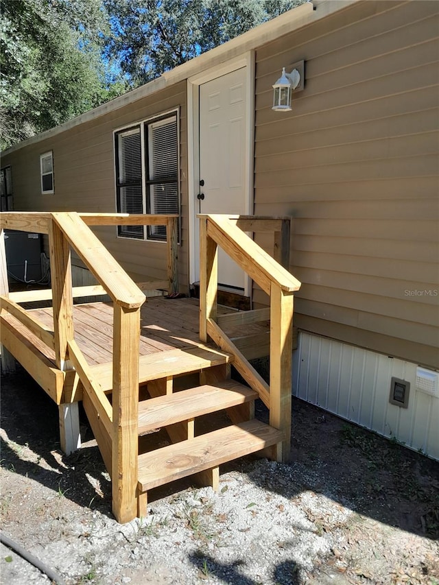 exterior space featuring a wooden deck