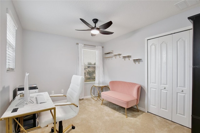 office area with ceiling fan and light colored carpet