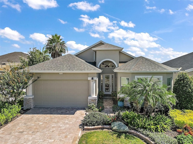 view of front of home with a garage