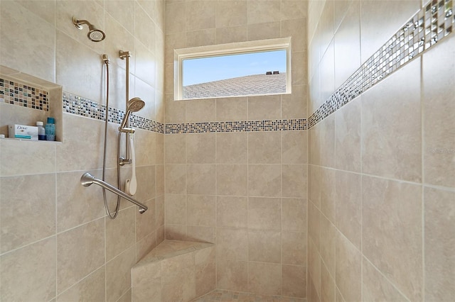 bathroom featuring a tile shower