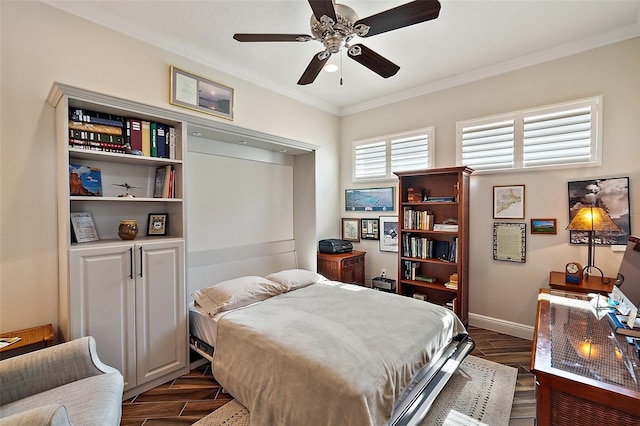 bedroom featuring ceiling fan and crown molding