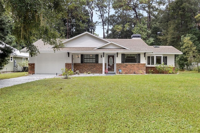 ranch-style house with a garage and a front yard