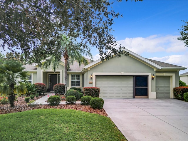 ranch-style house with a front yard and a garage