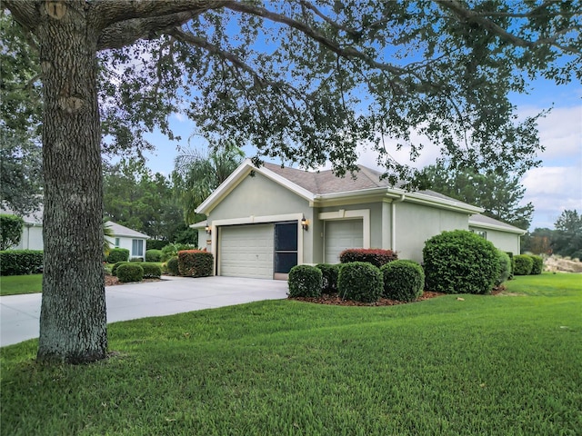 view of home's exterior with a lawn and a garage