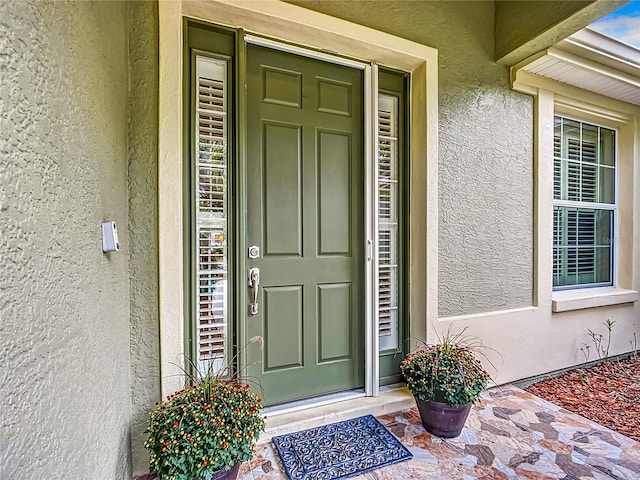 property entrance with a porch