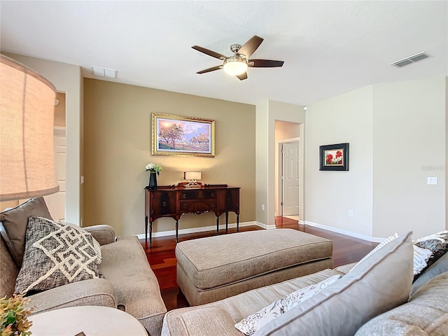 living room with hardwood / wood-style floors and ceiling fan