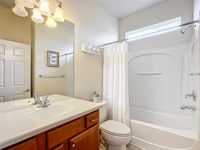 full bathroom featuring vanity, toilet, and shower / bathtub combination with curtain