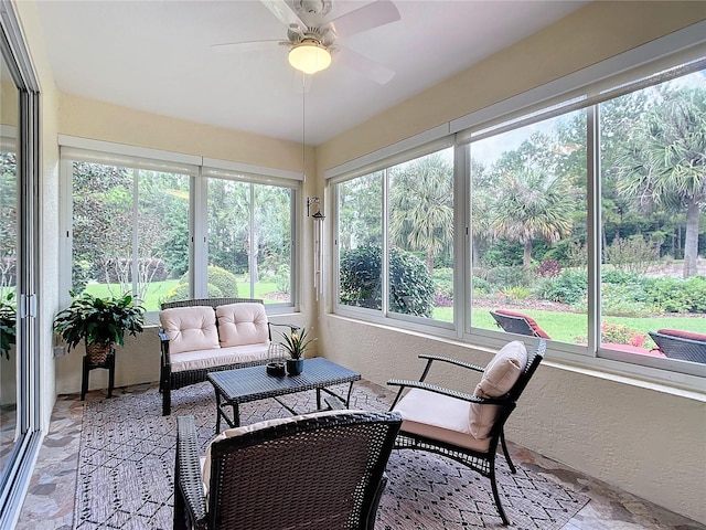 sunroom / solarium with ceiling fan and plenty of natural light