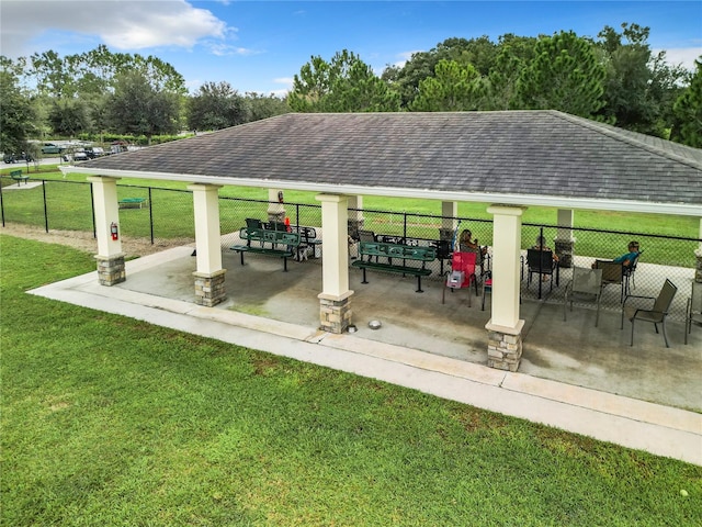 exterior space with a patio and a yard