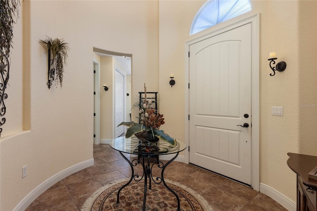 foyer entrance featuring tile patterned floors