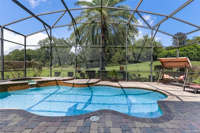 view of swimming pool with a patio, glass enclosure, and an in ground hot tub