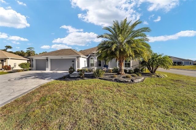 view of front of house featuring a front lawn and a garage