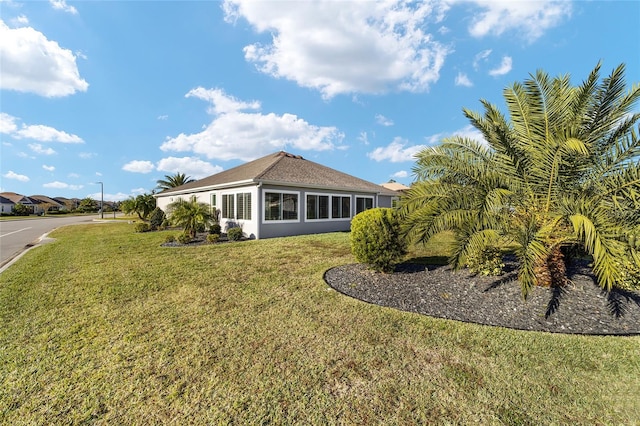 exterior space featuring a sunroom