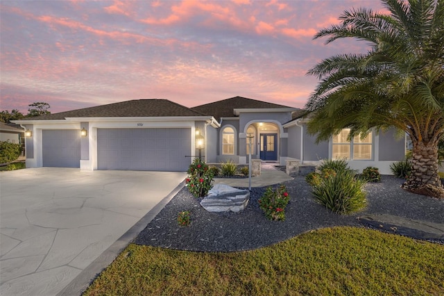 view of front of property featuring a garage