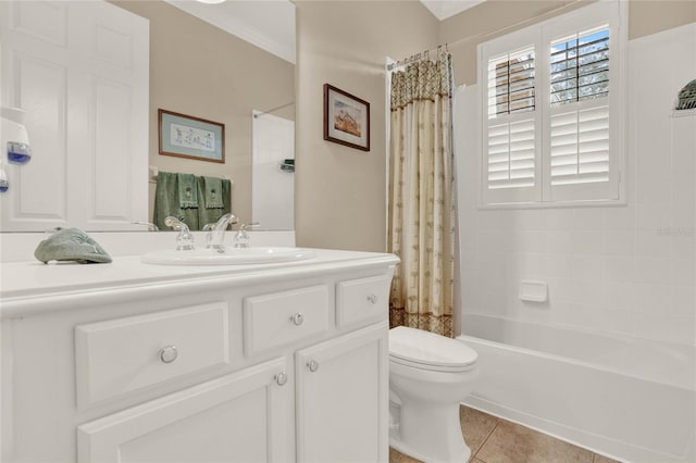 full bathroom with tile patterned floors, shower / bath combo, vanity, and toilet