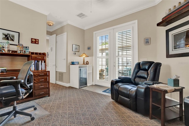 office with light colored carpet, beverage cooler, and ornamental molding