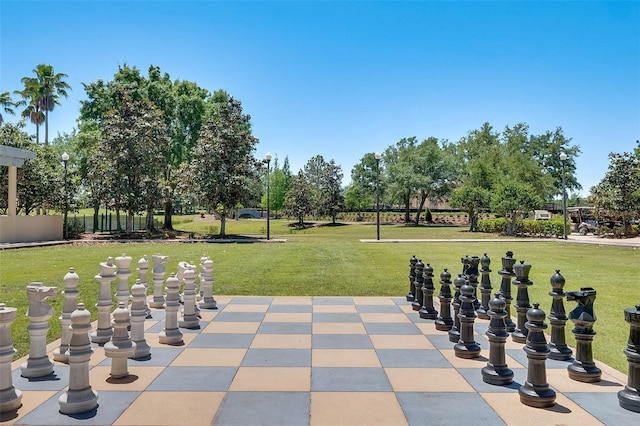 surrounding community featuring a yard and a patio area