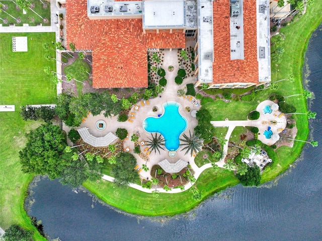 birds eye view of property with a water view