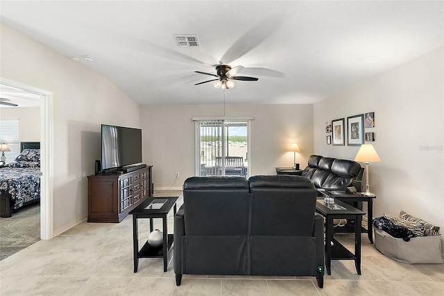 living room featuring ceiling fan