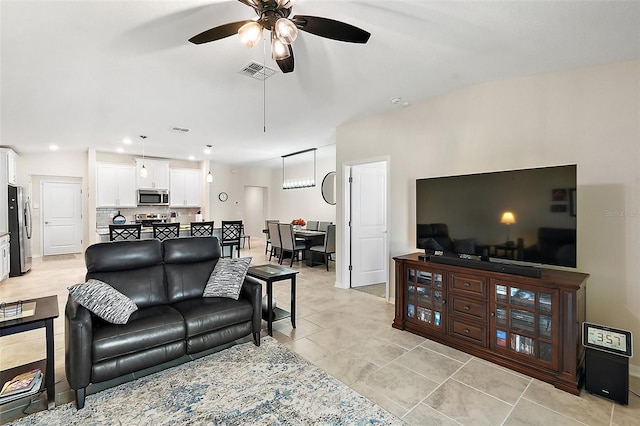 living room featuring ceiling fan