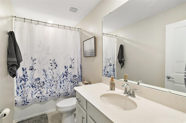 bathroom featuring toilet, vanity, visible vents, tile patterned floors, and shower / bathtub combination with curtain