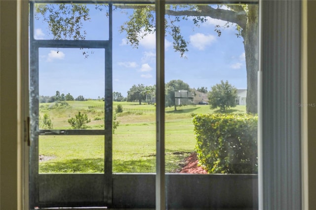 doorway to outside featuring a rural view