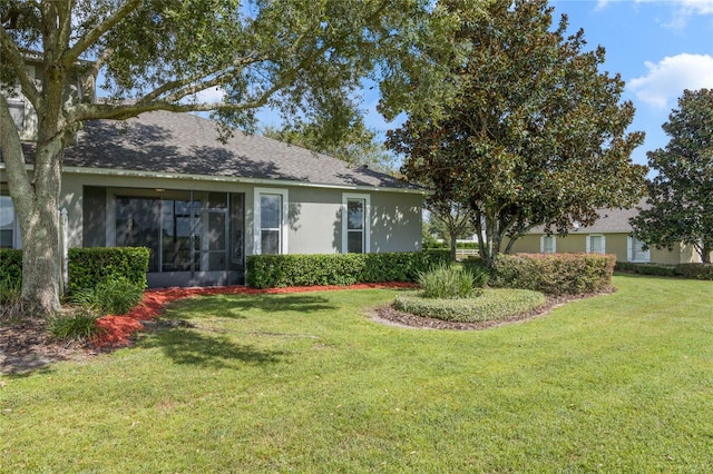 view of front of home with a front yard