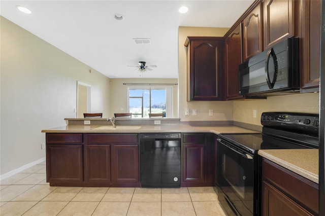 kitchen featuring black appliances, ceiling fan, light tile patterned flooring, and sink