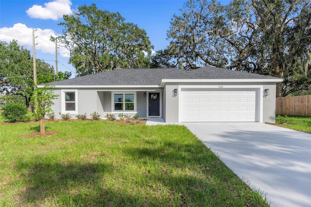 ranch-style house with a front yard and a garage