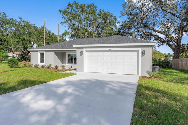 ranch-style home with a front lawn and a garage