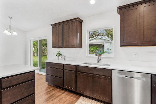 kitchen with sink, light hardwood / wood-style flooring, dishwasher, and plenty of natural light