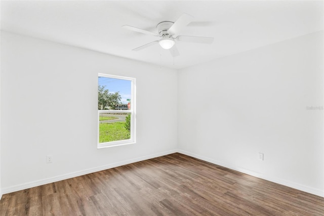 unfurnished room featuring ceiling fan and hardwood / wood-style floors