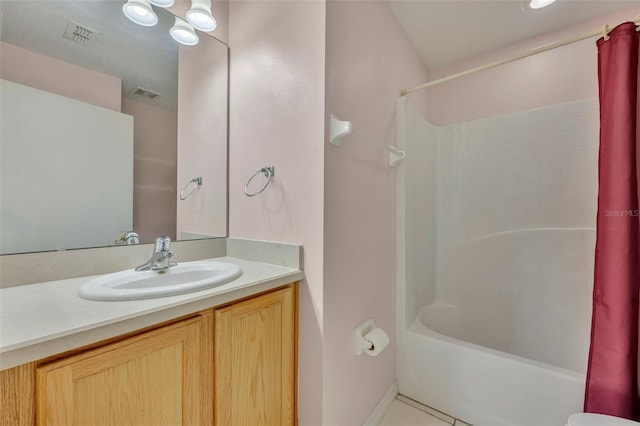 bathroom featuring shower / bath combo, tile patterned flooring, and vanity