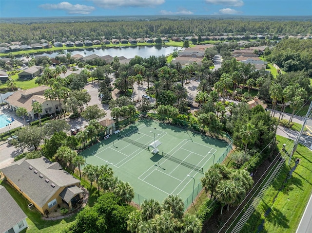 540 Grand Canal Dr, Kissimmee, FL 34759 - drone / aerial view featuring a wooded view, a water view, and a residential view