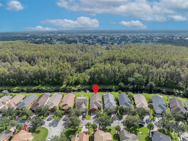 540 Grand Canal Dr, Kissimmee, FL 34759 - aerial view with a residential view and a forest view