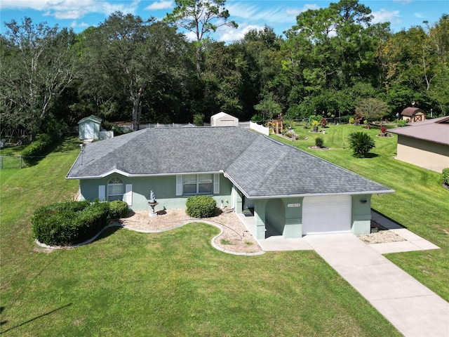 ranch-style home with a garage and a front lawn